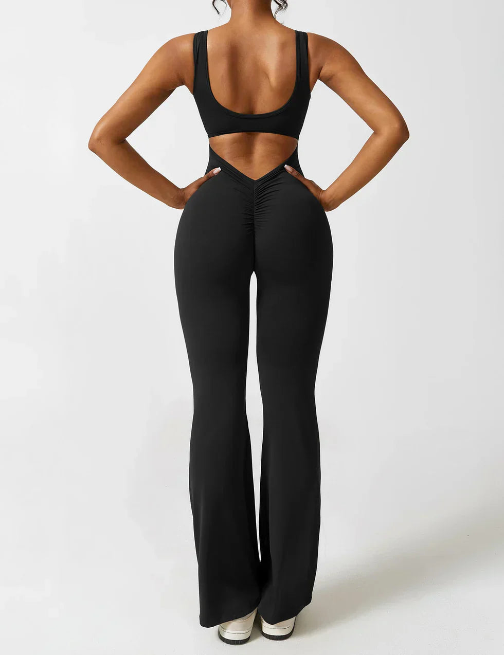 Elodie - Jumpsuit s rozšířenými nohavicemi a V-zadním výstřihem