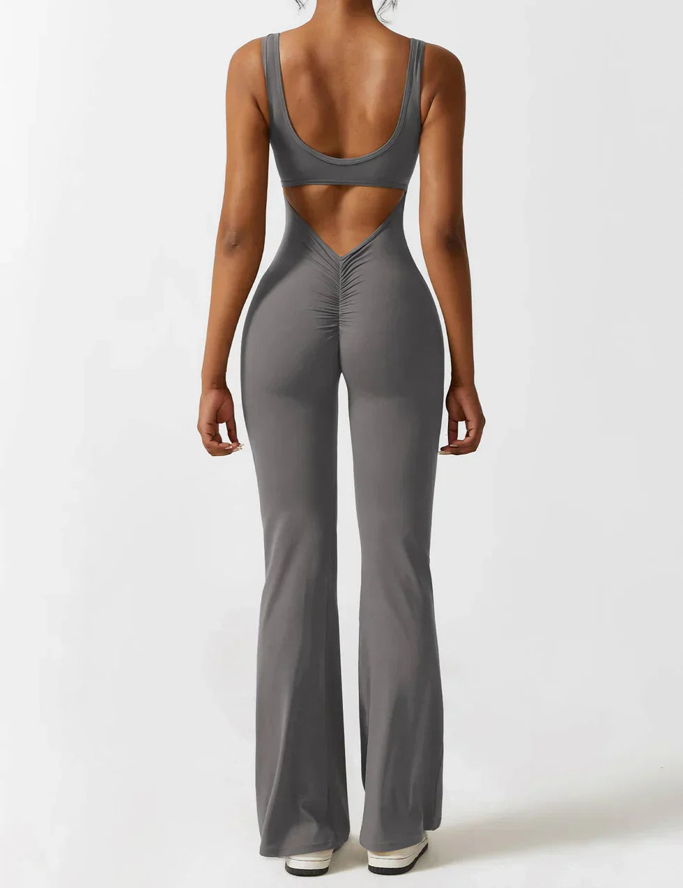 Elodie - Jumpsuit s rozšířenými nohavicemi a V-zadním výstřihem
