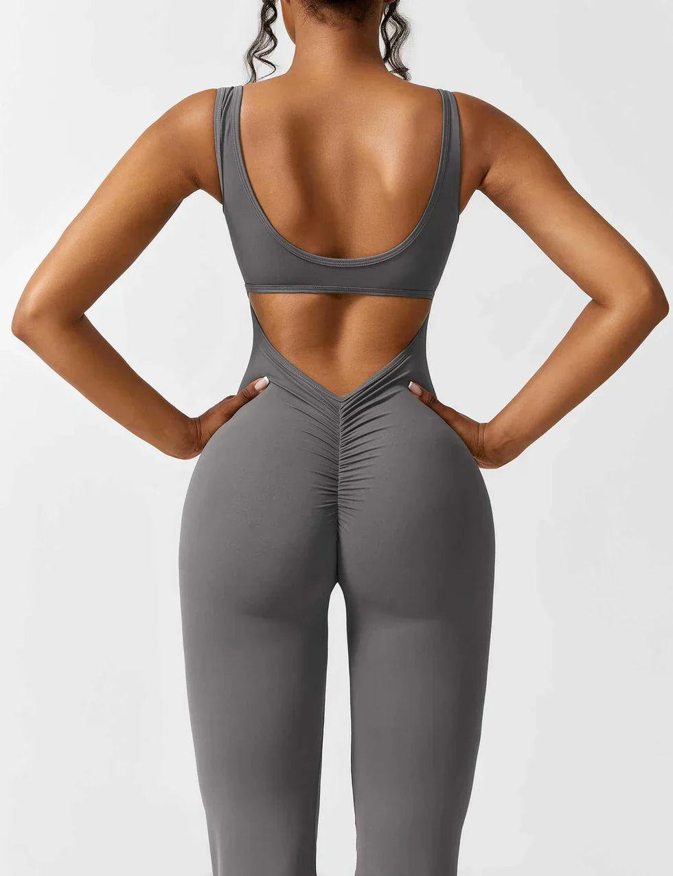 Elodie - Jumpsuit s rozšířenými nohavicemi a V-zadním výstřihem